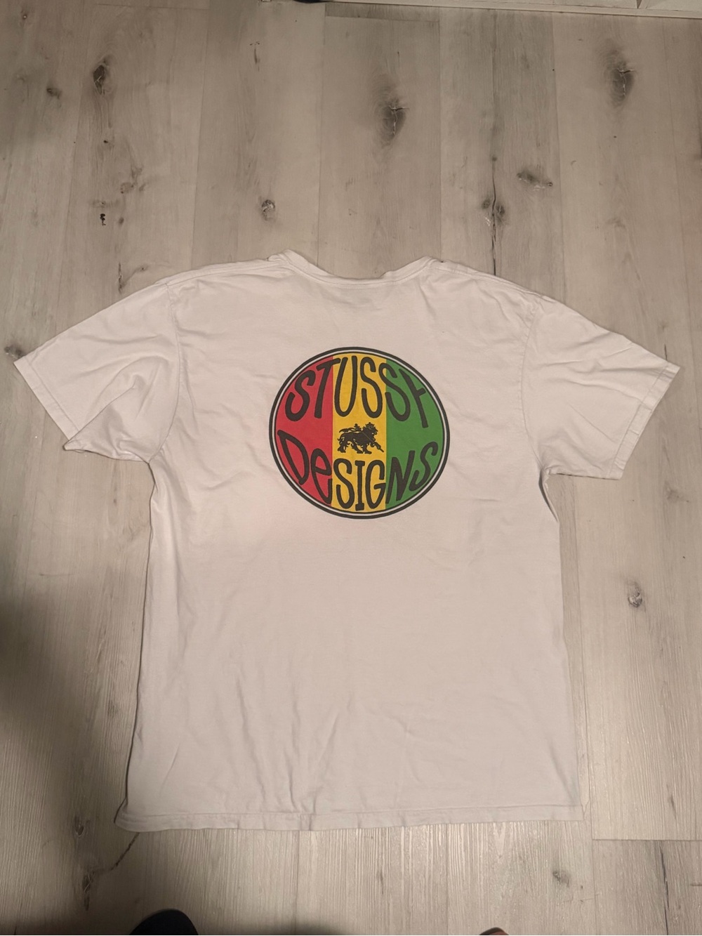 Stussy White Short-Sleeve Tee with Red/Yellow/Green Circular Logo